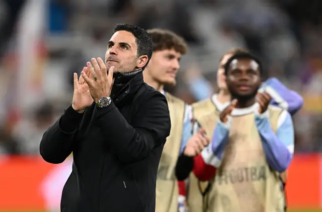 Mikel Arteta, Manager of Arsenal, applauds the fans