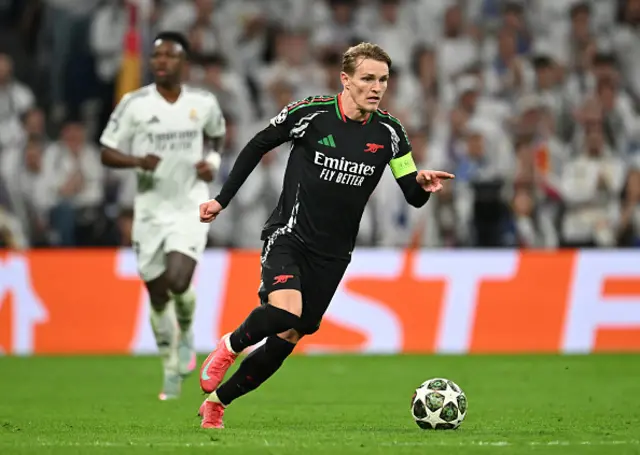 Martin Odegaard of Arsenal runs with the ball