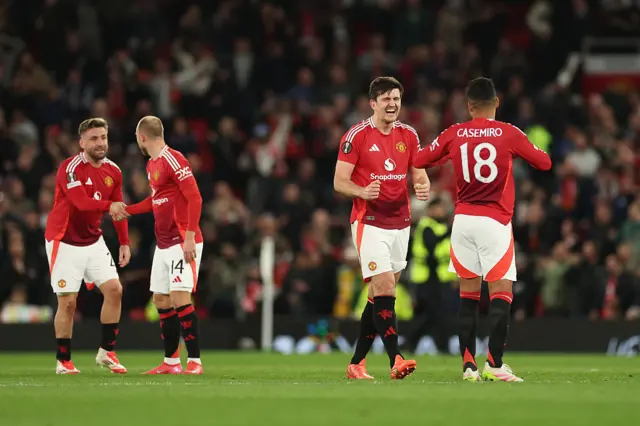 Harry Maguire and Casemiro of Manchester United celebrate victory