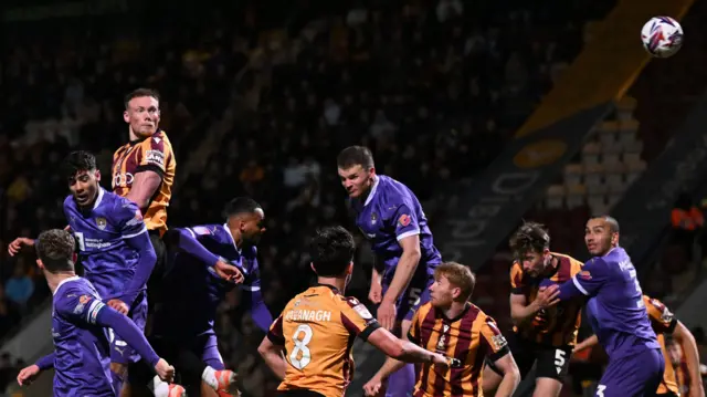 Ciaran Kelly heads Bradford ahead against Notts County