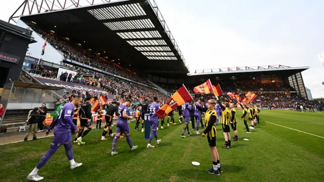 The teams walk out at Valley Parade