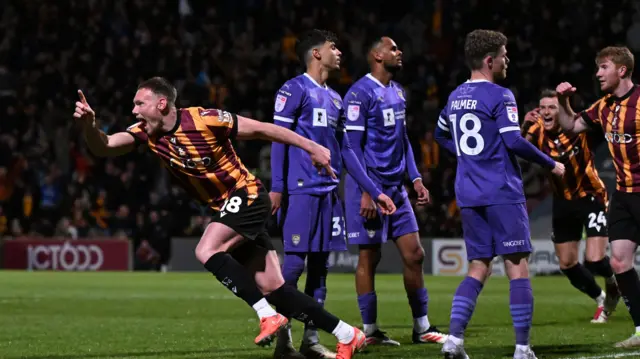 Ciaran Kelly celebrates scoring for Bradford against Notts County