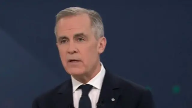 Carney speaking headshot