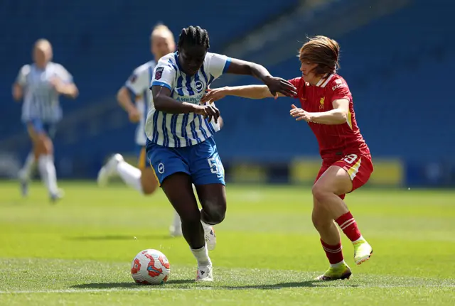 Agyemang holds off a challenge from Bernabe