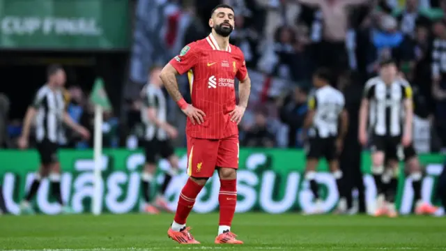 Mohamed Salah of Liverpool looks dejected after Alexander Isak of Newcastle United scored