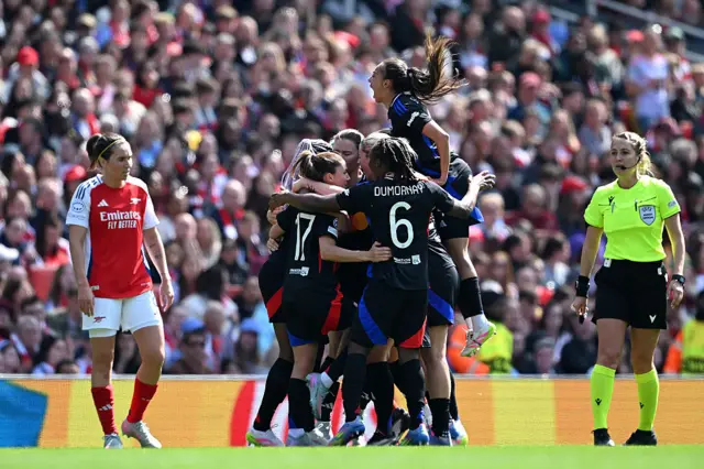 Kadidiatou Diani of Olympique Lyonnais celebrates scoring her team's first goal with teammates during the UEFA Women's Champions League semifinal first leg match between Arsenal WFC and Olympique Lyonnais on April 19, 2025 in London, England.