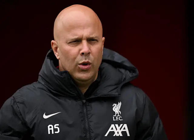 Arne Slot head coach of Liverpool looks on