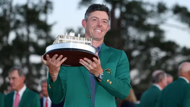 Rory McIlroy with the Masters golf trophy