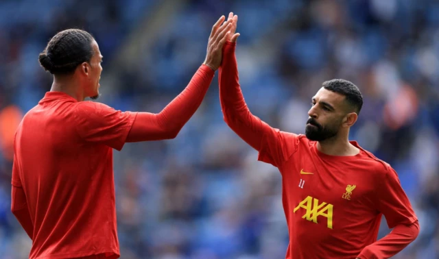 Liverpool's Virgil van Dijk and Mohamed Salah during the warm up