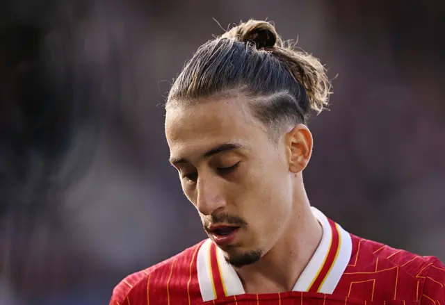 Kostas Tsimikas of Liverpool looks on