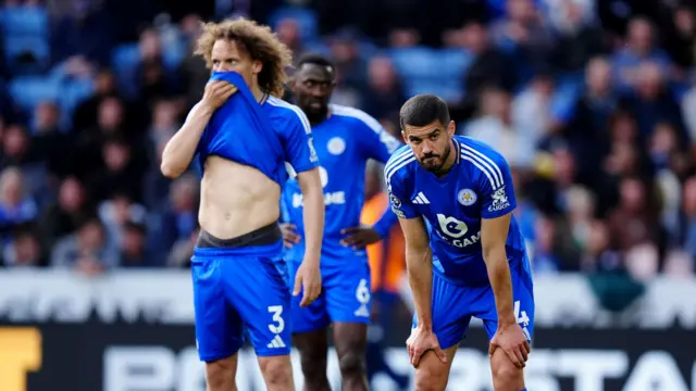 Leicester City's Conor Coady and Wout Faes dejected after conceding