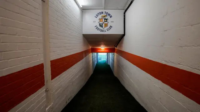 The players tunnel at Kenilworth Road