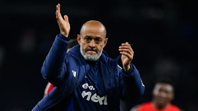 Forest manager waves to fans