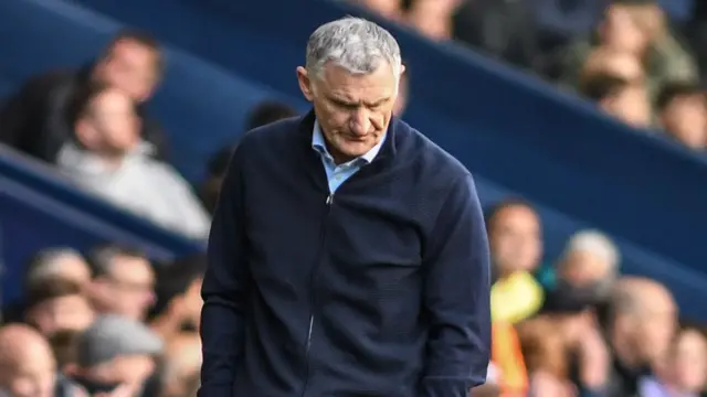 West Brom manager Tony Mowbray looks downwards