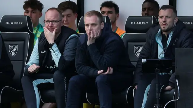 Norwich head coach Johannes Hoff-Thorup sat in the dugout