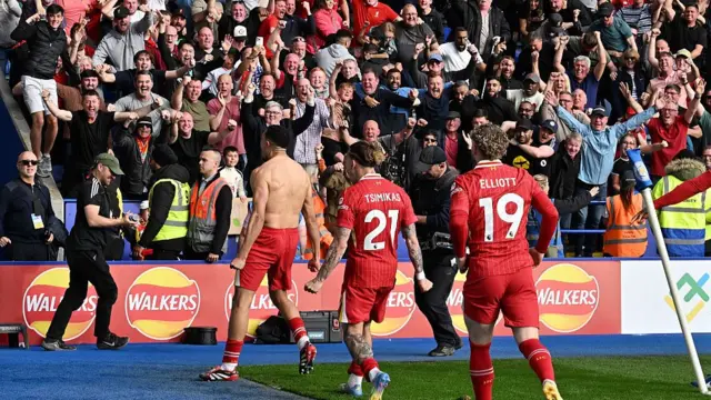 Trent Alexander-Arnold celebrates with Liverpool fans
