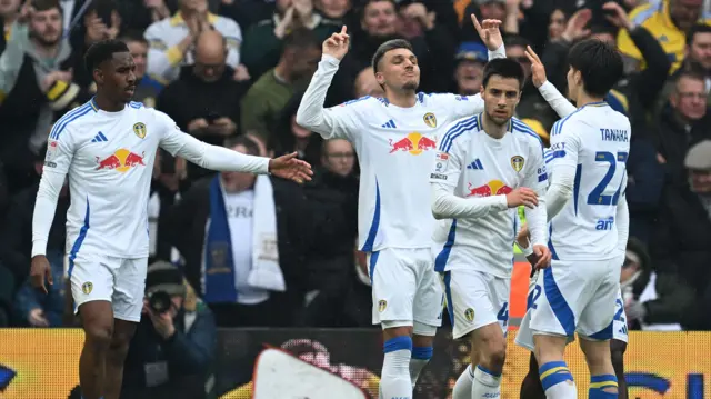 Leeds goalscorer Joel Piroe points to the sky