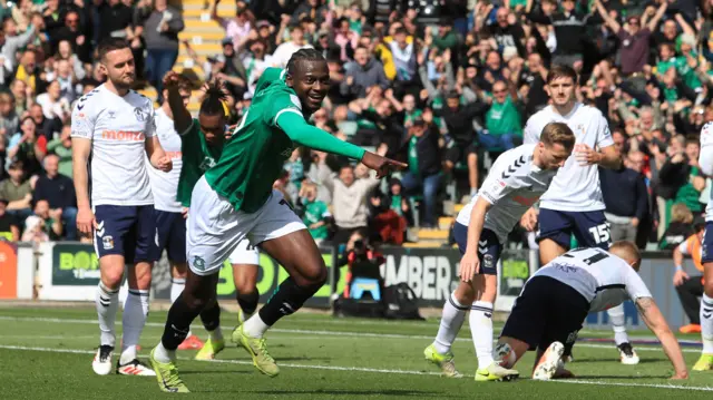 Plymouth's Mustapha Bundu celebrates