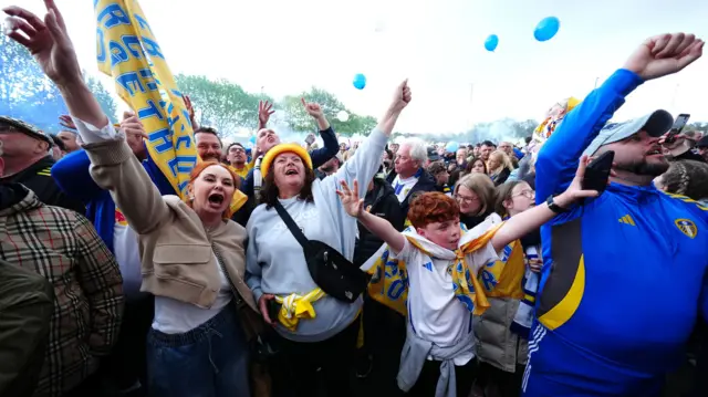 Leeds fans celebrate promotion outside Elland Road