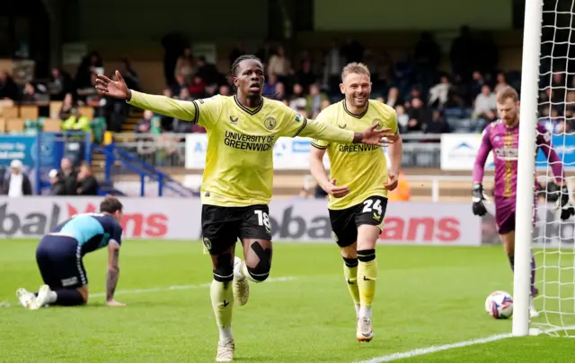 Charlton Athletic's Karoy Anderson (centre) celebrates scoring their side's fourth goal