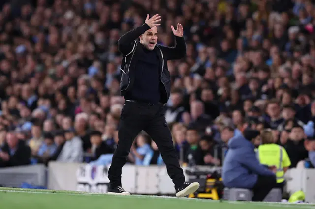 Pep Guardiola reacts