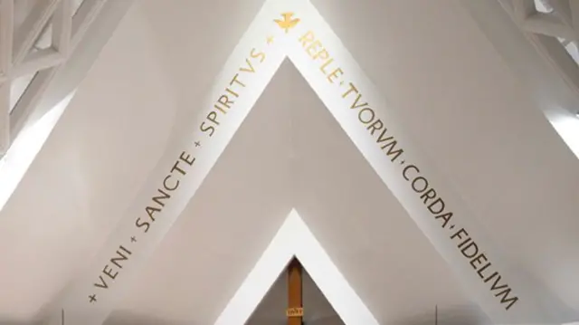 Latin inscription on ceiling of Casa Santa Marta which reads Veni sancte spiritus reple tuorum corda fidelum