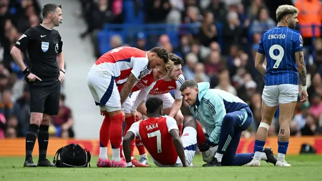Saka receiving treatment against Ipswich