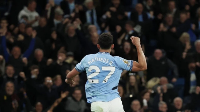 Manchester City's Matheus Nunes celebrates