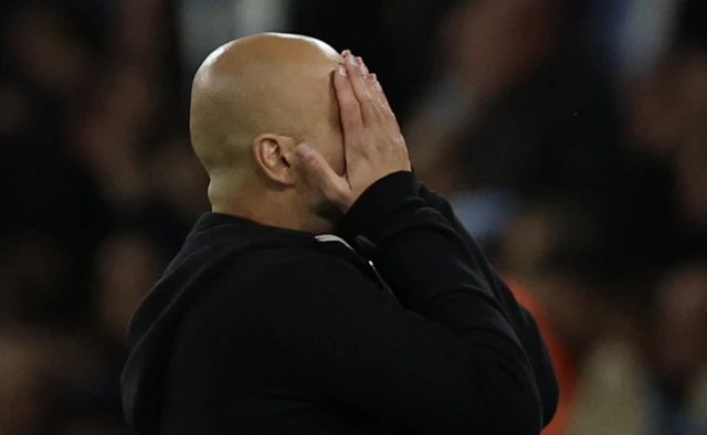 Manchester City manager Pep Guardiola reacts