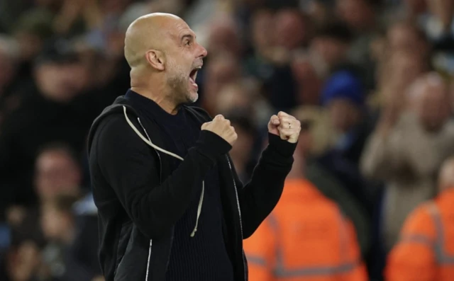 Pep Guardiola celebrates