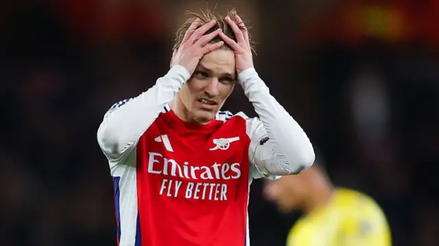 Martin Odegaard of Arsenal looks dejected