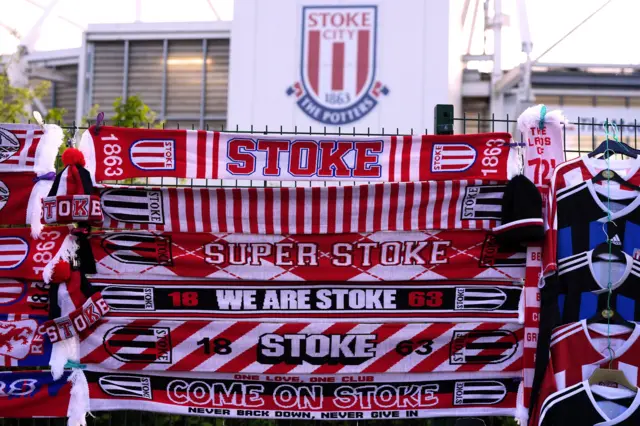 Stoke scarves at a stall outside the ground