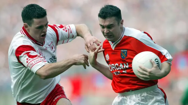 Conor Gormley challenges Oisin McConville during the 2003 All-Ireland Final