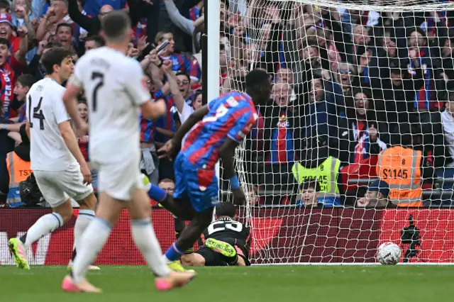 Ismaila Sarr (C) scores