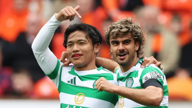 Reo Hatate points to Jota