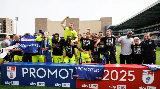 Port Vale celebrate promotion.