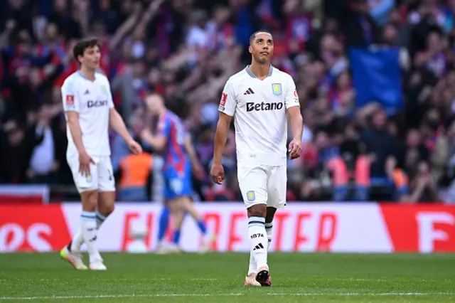 Youri Tielemans of Aston Villa looks dejected