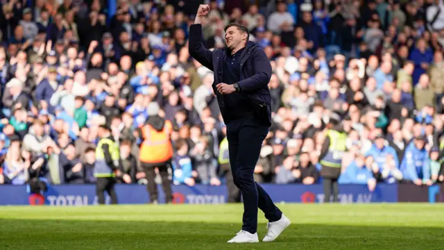 Portsmouth boss John Mousinho celebrates securing Championship safety after the win over Watford