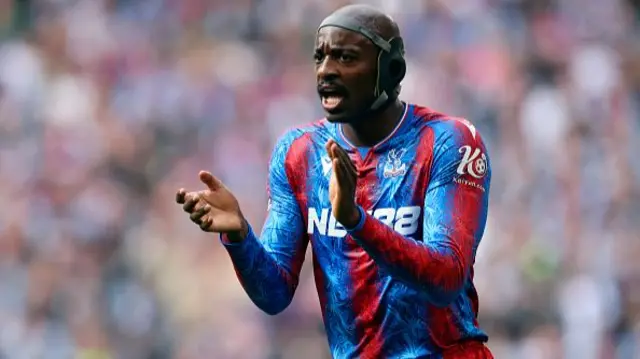 Jean-Philippe Mateta of Crystal Palace applauds a play