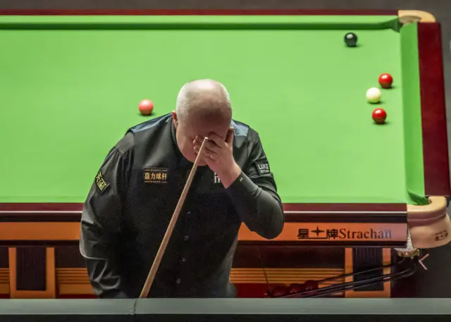 John Higgins dejected