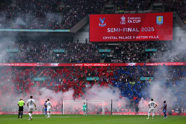 A general view as fans of Crystal Palace set off smoke flares in the stands