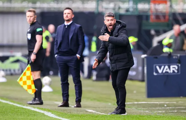 Stephen Robinson and Barry Ferguson on the touchline