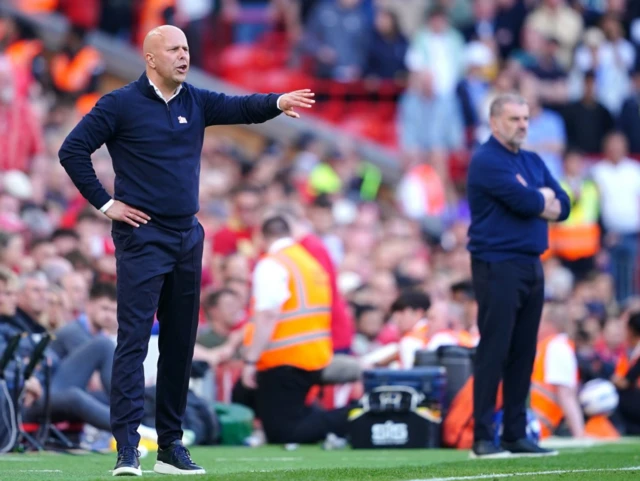 Liverpool manager Arne Slot (left) and Tottenham Hotspur manager Ange Postecoglou look on