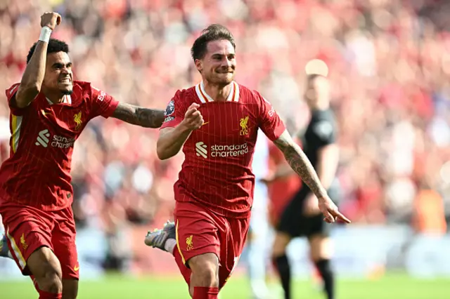 Alexis Mac Allister (R) celebrates