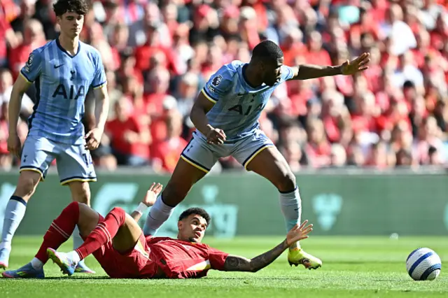 Kevin Danso (R) vies with Liverpool's Colombian midfielder Luis Diaz