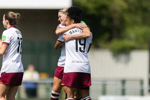 Shekiera Martinez of West Ham United celebrates with Verena Hanshaw after scoring to make it 1-0 during the Barclays Women's Super League match between Crystal Palace and West Ham United on April 27, 2025 in Sutton, England.