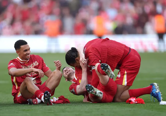 Trent Alexander-Arnold, Andrew Robertson and Virgil van Dijk of Liverpool celebrate
