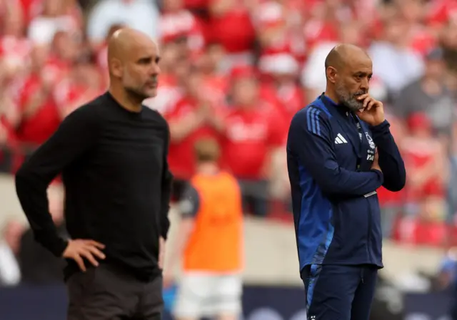 Pep Guardiola and Nuno Santo