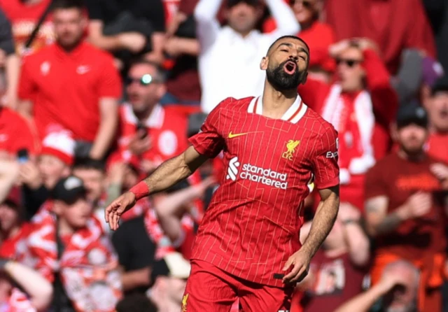 Liverpool's Mohamed Salah reacts