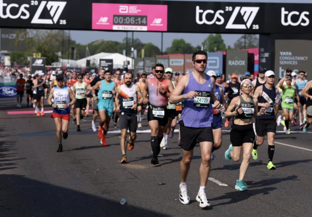 Runners during the mass start of the London Marathon